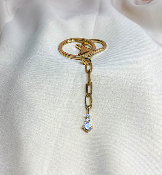 Crystal solitaire gold bag charm